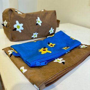 Baggu dopp kit and flat pouches in painted daisy
